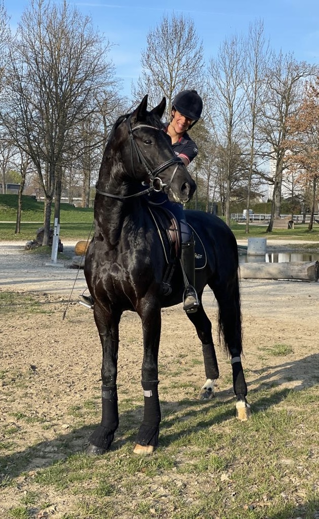 Judith Shiferaw riding a dressage horse